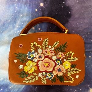 ModCloth floral clutch bag with strap